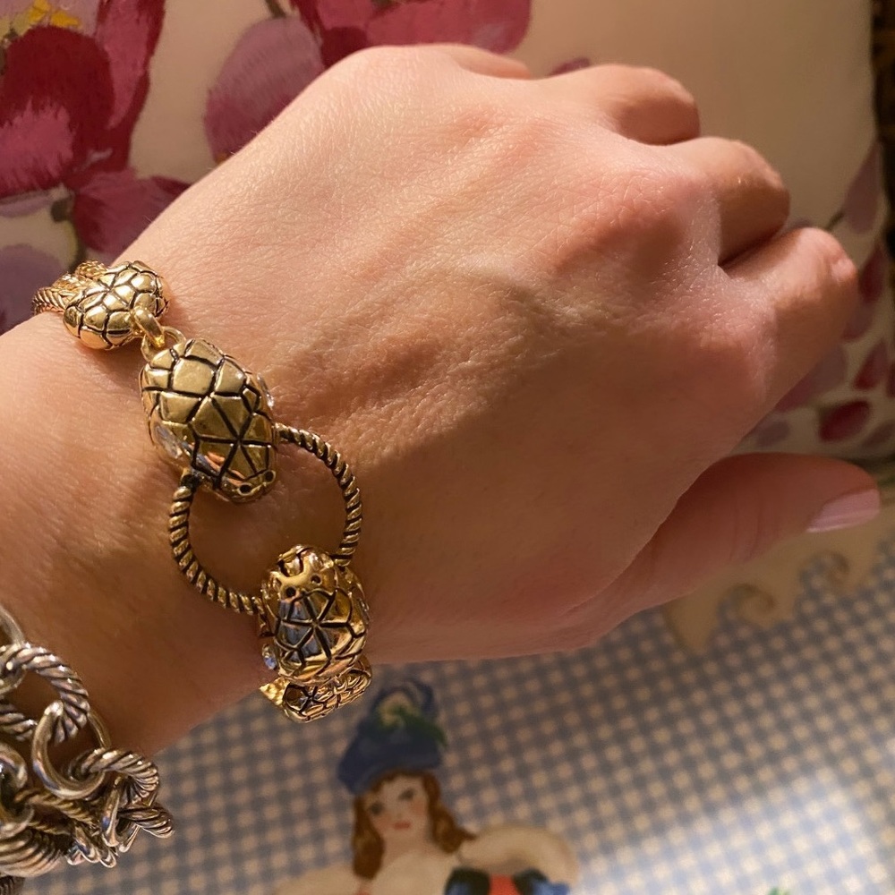 Gold tone snake bracelet